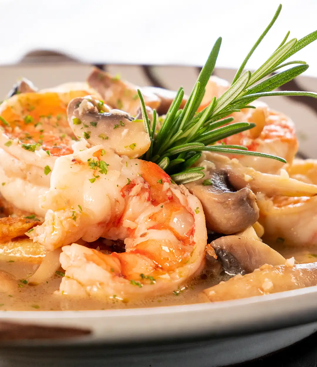 Camarones y Champiñones al Ajo y Romero.